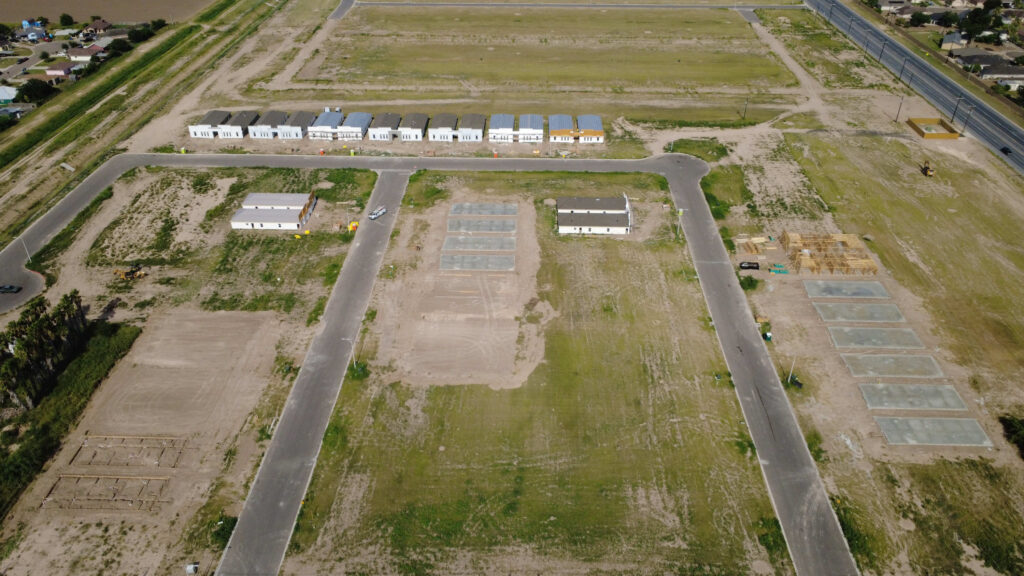 aerial view of homes and land in the riverside tower fourplex homes in alamo, texas