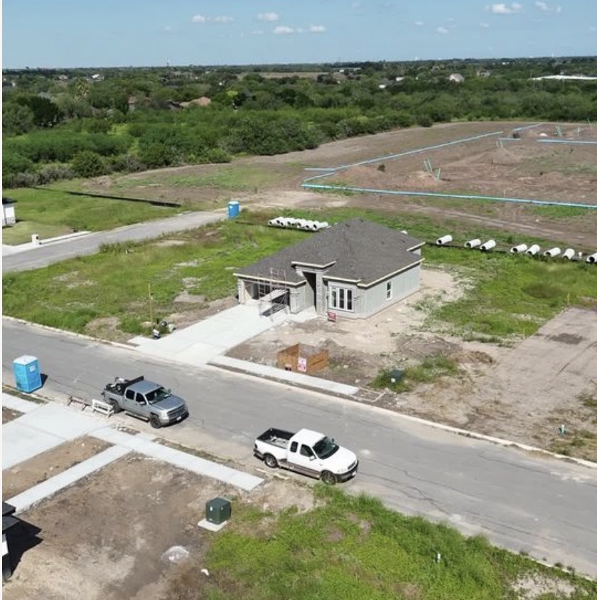 aerial view of home under construction in Hacienda Olivia in Mercedes, TX
