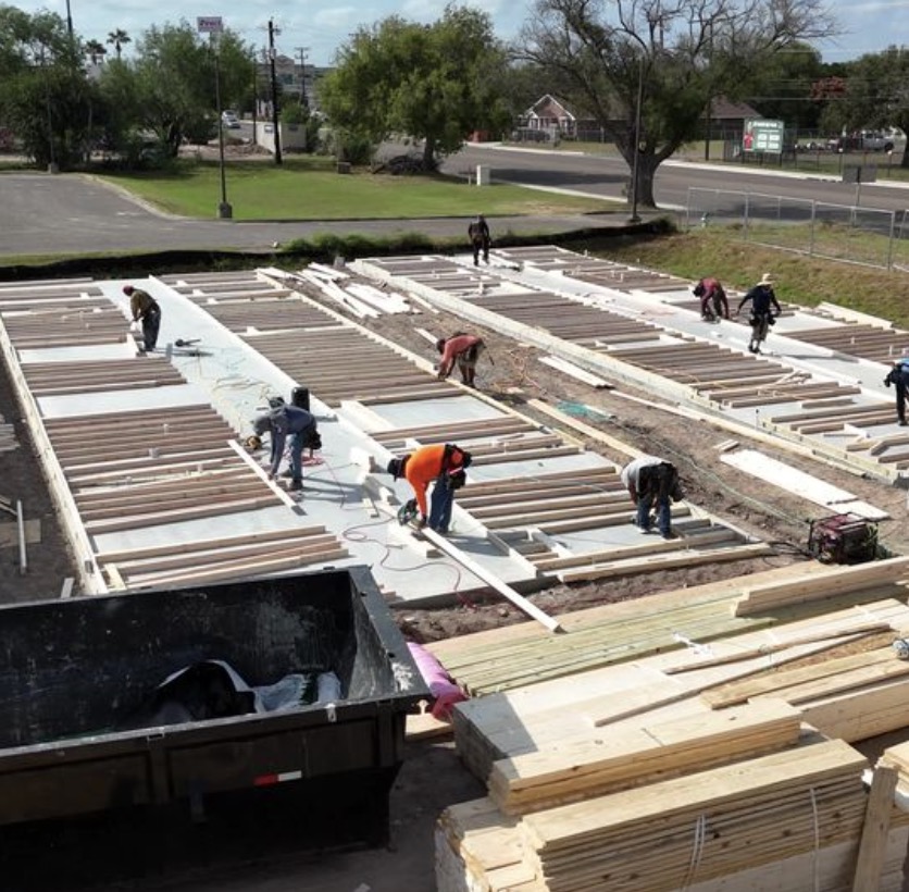 homes under construction with crews in the palmira development in alamo, tx