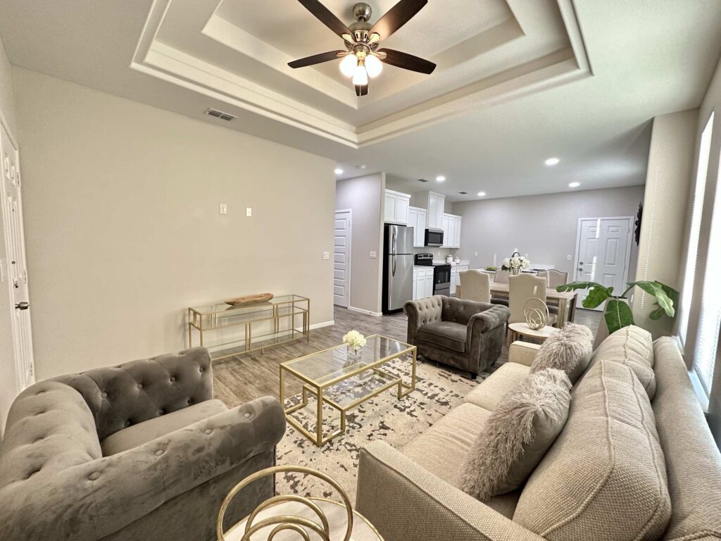 View of living room, dining room, kitchen in the Dawson Estates Fourplex in Mercedes Texas