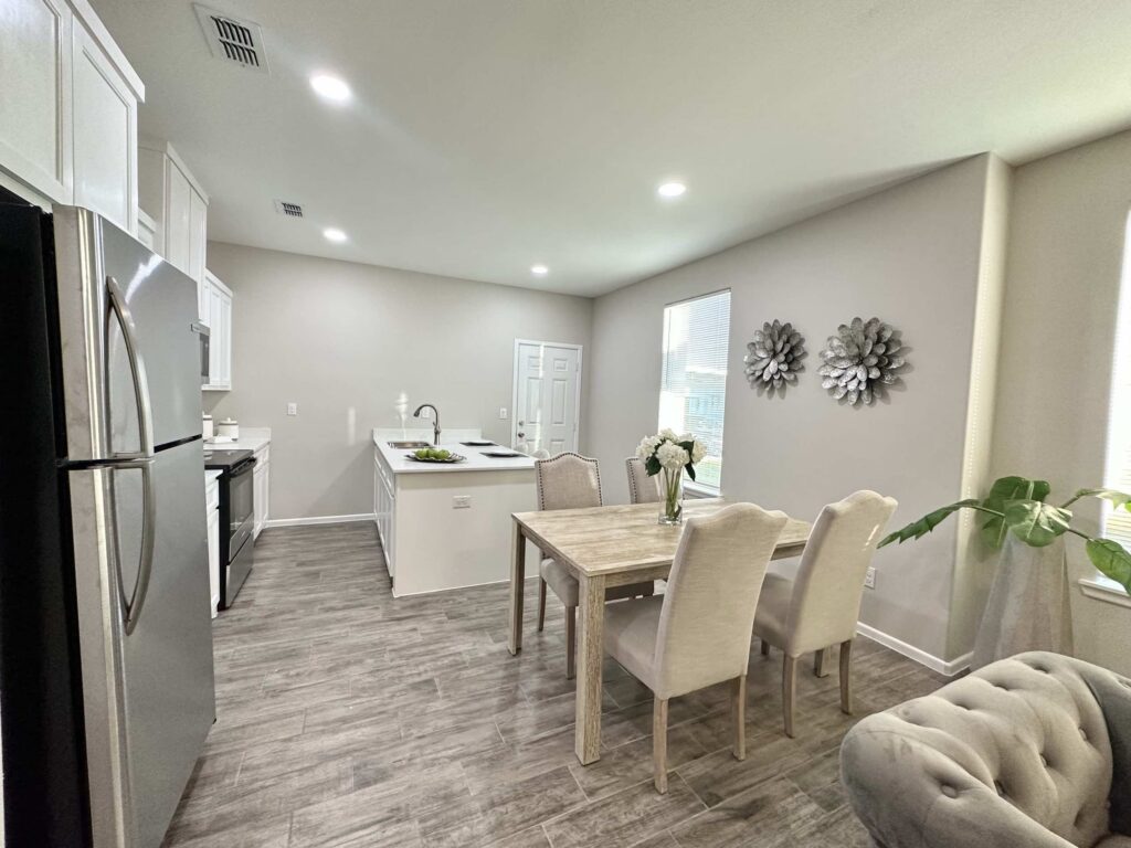 View of dining rom and kitchen in the Dawson Estates Fourplex in Mercedes Texas